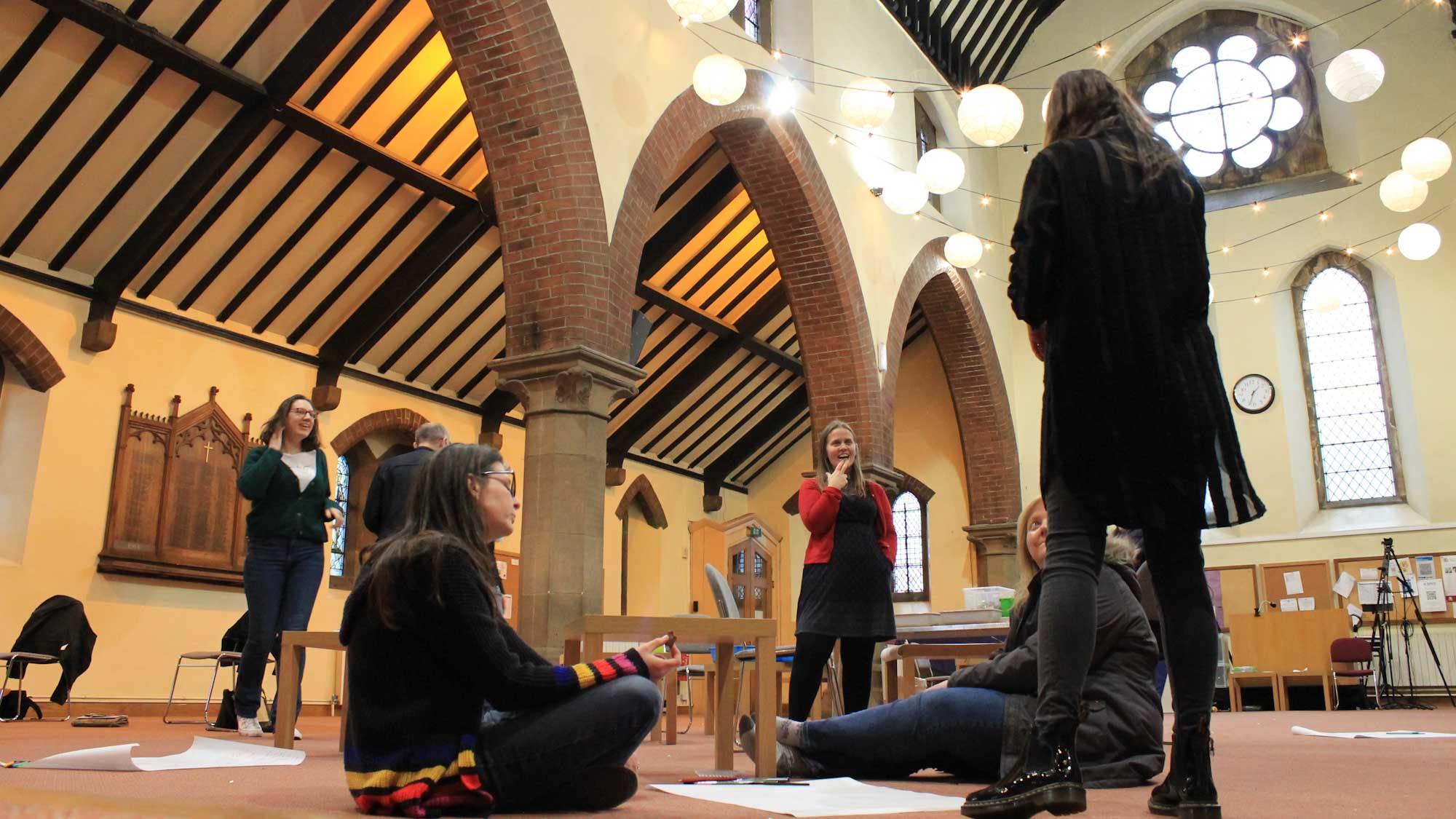 Group of people doing a planning activity in a church